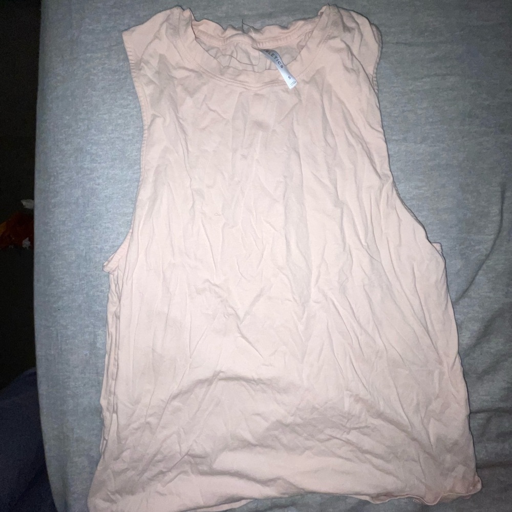 Soft pink muscle tee workout top